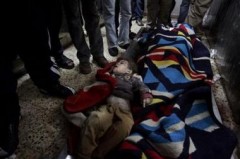 3069414130-palestinians-gather-around-the-body-of-a-child-found-in.jpg